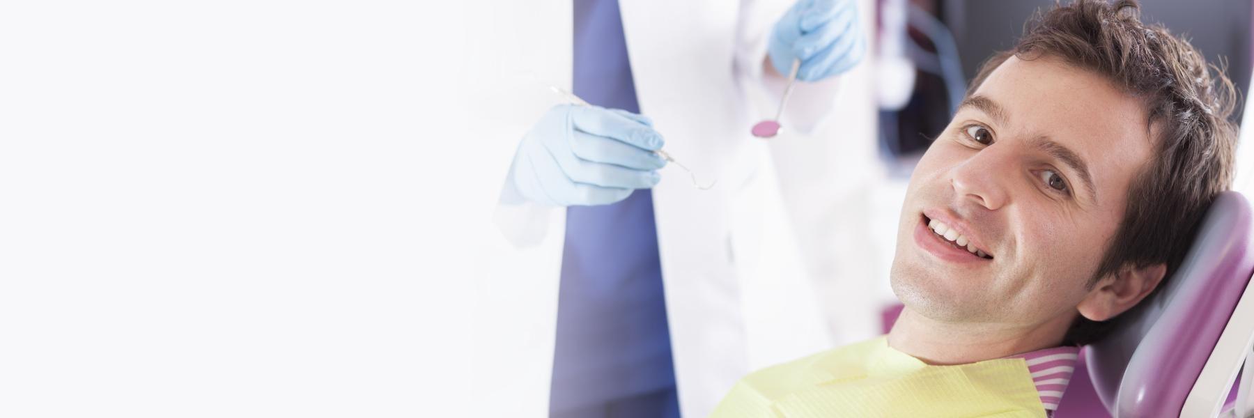 Patient in chair after undergoing teeth cleaning in Edmond OK