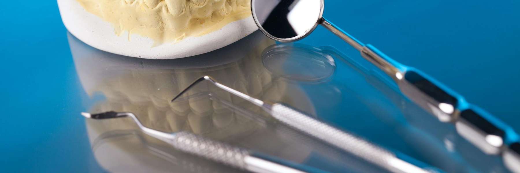 An illustration of dental implants and tools at Edmond Dental Center