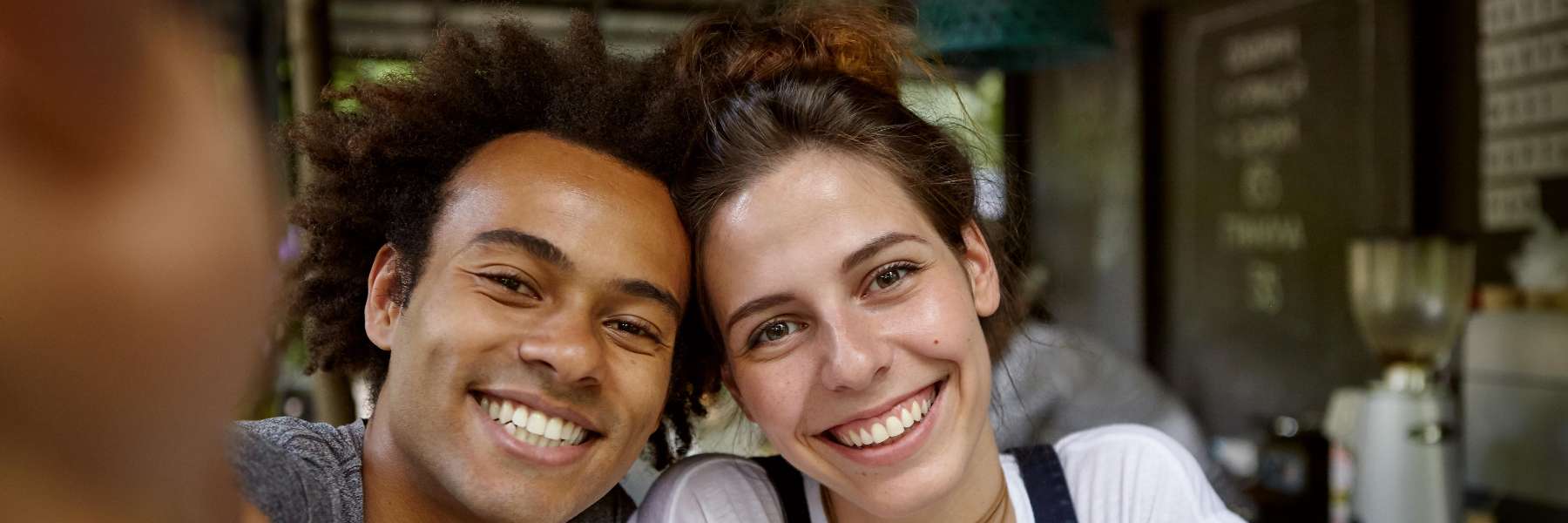 A couple smiling after dental cleaning in Edmond Dental Center