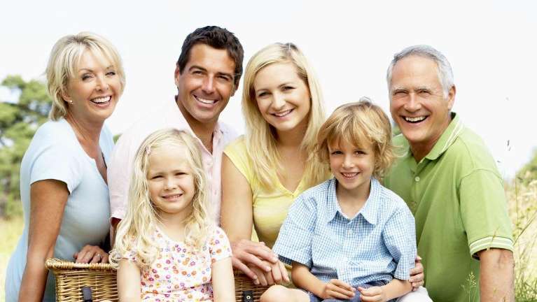 Family laughing after visiting Edmond dental center, Edmond OK