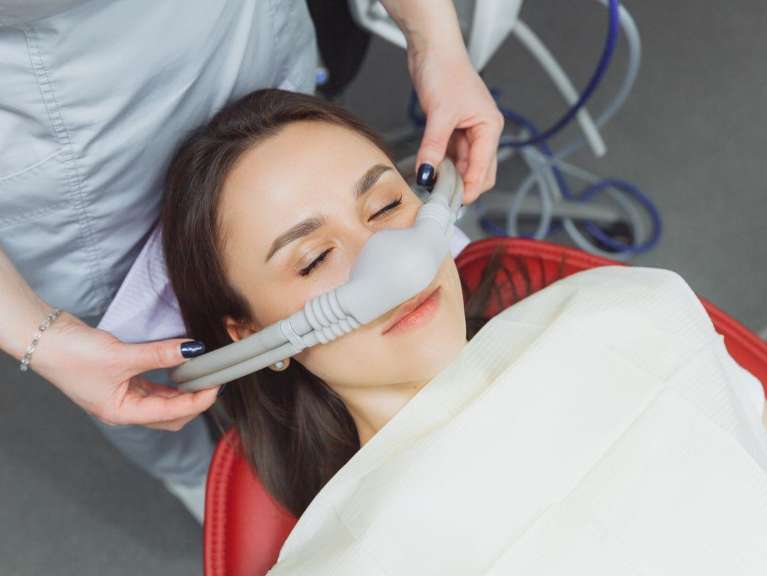 A woman getting Sedation Dentistry in Edmond, OK