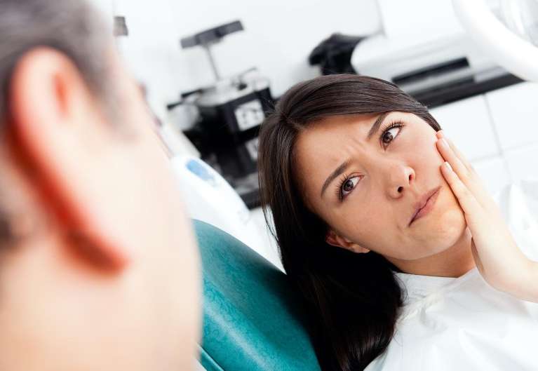 A patient with Urgent Dental Care in Edmond, OK