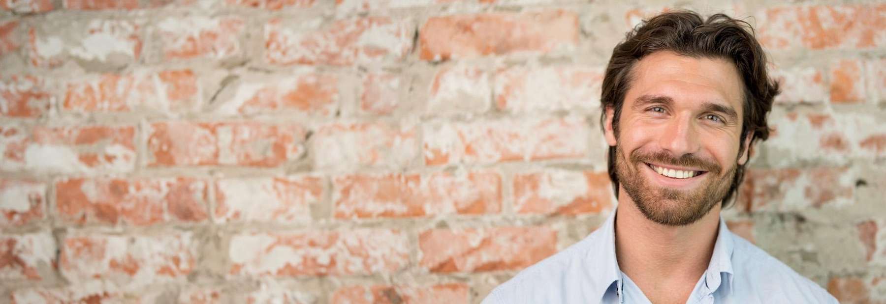 A man with Same-Day Dental Crowns in Edmond, OK