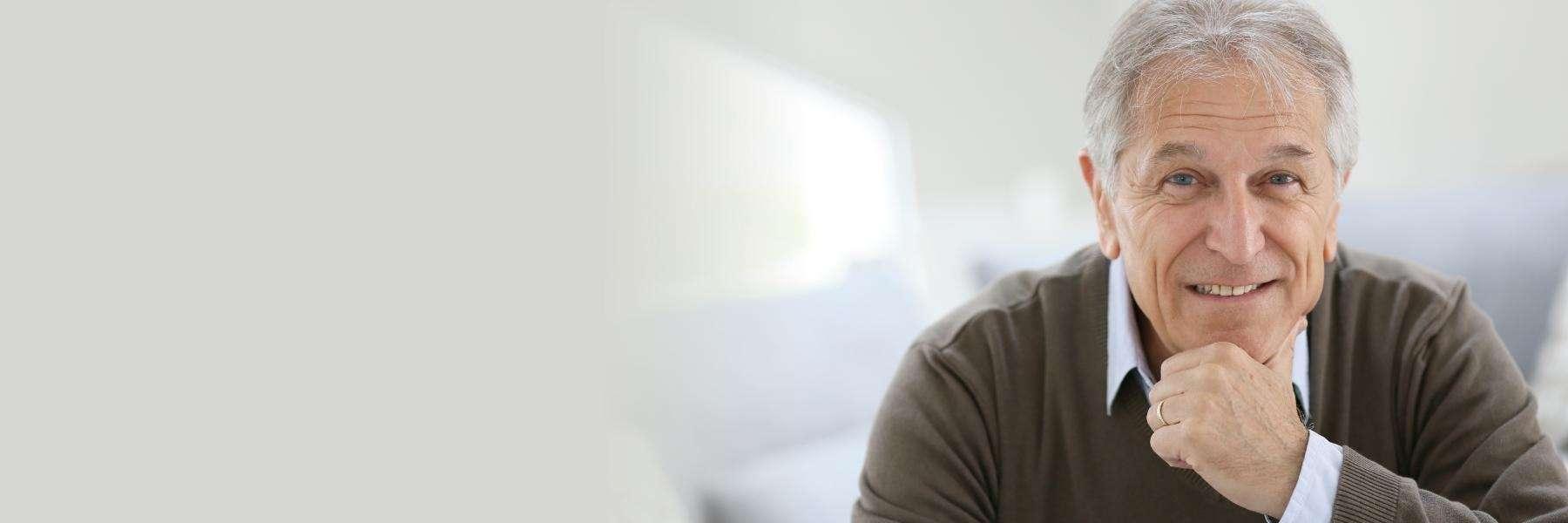 Man smiling after root canal treatment in Edmond, OK